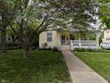 Charming single Gathering home with covered front porch, stairway, and a sidewalk at 414 E Main St, Plainfield, IN 46168