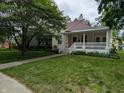 Charming single Gathering home featuring a lovely lawn and covered front porch at 414 E Main St, Plainfield, IN 46168
