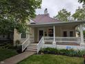 Charming single Gathering home with front porch and stairway at 414 E Main St, Plainfield, IN 46168