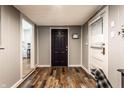 Inviting entryway with hardwood floors and a view into other rooms of the home at 5736 Primrose Ave, Indianapolis, IN 46220