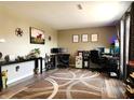 Spacious home office featuring a neutral palette, large windows and multiple workstations at 6161 E Runnymede Ct, Camby, IN 46113