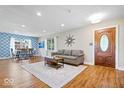Comfortable living room with stylish decor and hardwood floors at 11424 Green St, Carmel, IN 46033