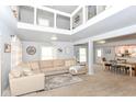 Spacious open-concept living room with seamless transition to the dining and kitchen areas at 1302 Main St, Elwood, IN 46036