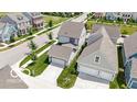 Aerial view of homes showcasing neighborhood layout, landscaping, and community setting at 1892 Ponsonby Dr, Westfield, IN 46074