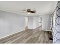 Spacious living room featuring sleek, modern flooring and ample natural light for a bright and airy feel at 217 W Burnside Ave, Fairland, IN 46126