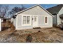 Charming single-story home with gray siding, well-maintained lawn, and inviting entrance at 3330 S Mooresville Rd, Indianapolis, IN 46221