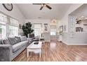 Inviting living room with comfortable seating, natural light, and stylish decor at 5217 Dunewood Way # 3002, Avon, IN 46123