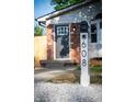 Street view of the house displaying the house number on the mailbox at 608 Manhattan Ave, Indianapolis, IN 46241