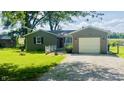 Charming one story home with well maintained lawn and attached one car garage at 8336 S Belmont Ave, Indianapolis, IN 46217