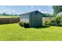 Exterior photo of a backyard shed with lots of lawn at 8336 S Belmont Ave, Indianapolis, IN 46217