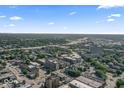 Wide aerial view of the city showing the green painted townhomes and surrounding buildings at 914 N Alabama St, Indianapolis, IN 46202