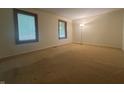 Spacious bedroom with carpet and two large windows at 1289 Woodcreek Dr, Greenwood, IN 46142