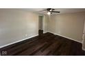 Inviting living room featuring hardwood floors and neutral paint, creating a warm and spacious atmosphere at 4405 Phoenix Dr, Indianapolis, IN 46241
