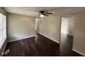 Inviting living room featuring hardwood floors and neutral paint, creating a warm and spacious atmosphere at 4405 Phoenix Dr, Indianapolis, IN 46241