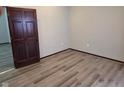 Bedroom featuring hardwood floors and neutral paint at 624 Warren Ave, Indianapolis, IN 46221