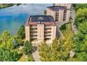 Overhead view of condos with balconies showcasing waterfront living and picturesque scenery at 6640 Page Blvd # 101, Indianapolis, IN 46220