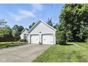 Traditional home with a two-car garage, attractive curb appeal, and a well-kept lawn at 8929 Sunburst Cir, Indianapolis, IN 46227