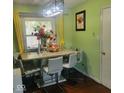 Cozy dining area with a marble table and comfortable seating, perfect for Gathering meals at 10210 E 33Rd St, Indianapolis, IN 46235