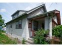 Charming exterior of a house with lattice and porch, offering curb appeal at 320 N Colorado Ave, Indianapolis, IN 46201
