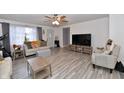 Inviting living room with a large window, stylish decor, and comfortable seating at 335 Park St, Noblesville, IN 46060