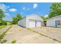 Spacious detached garage with ample parking and convenient access to the home at 4644 E 150 N, Anderson, IN 46012