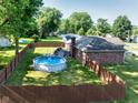 Fenced backyard featuring above ground pool at 12113 N Rooker Rd, Mooresville, IN 46158