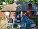 Aerial view of home's deck with black grill, table and chairs at 12113 N Rooker Rd, Mooresville, IN 46158