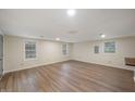 Bright living room offers ample space and natural light with multiple windows at 2009 N New York Ave, Muncie, IN 47304