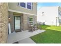 Inviting front porch with rocking chairs, creating a cozy and welcoming entryway for guests at 3075 W Crosscreek Dr, Monrovia, IN 46157