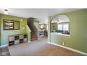 Spacious living area with archway and staircase leading to the next level, great for entertaining at 3075 W Crosscreek Dr, Monrovia, IN 46157