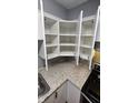 Corner kitchen storage with white cabinets, granite countertop and easy access to appliances at 4614 Runyon Lake W Dr, Greenwood, IN 46143