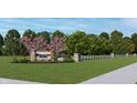 Welcome to the community, marked by an elegant stone sign surrounded by lush landscaping and greenery at 775 Rose Garden Way, Westfield, IN 46074