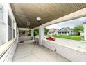 Relaxing front porch offering a glimpse of the neighborhood and a comfortable outdoor space at 806 N Gray St, Indianapolis, IN 46201
