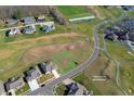 View of a large lot surrounded by well-maintained lawns and tree lined streets at 1130 Constitution Dr, Edinburgh, IN 46124
