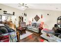 Comfortable living room with a ceiling fan and ample seating at 17401 Austrian Pine Way, Westfield, IN 46074