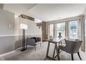 Cozy living room with neutral tones, comfortable seating, and natural light at 19469 Amber Way, Noblesville, IN 46060