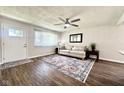 Cozy living room with modern decor, including a patterned rug and neutral-toned sofa at 2563 Harlan St, Indianapolis, IN 46203
