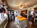 Spacious kitchen with a central island and stainless steel appliances at 430 W Locust St, Shelbyville, IN 46176