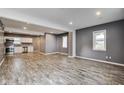 Spacious living room area featuring stylish flooring and neutral paint palette at 629 E 25Th St, Indianapolis, IN 46205