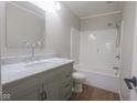 Updated bathroom with a shower and tub combo plus a marble vanity and new fixtures at 7300 N Banta Rd, Bargersville, IN 46106