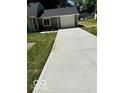 Newly poured concrete driveway leading to the attached one car garage at 7529 N Green Meadows, Fairland, IN 46126