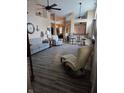 Spacious living room with new floors, a ceiling fan, and an open layout at 1311 Flintlock Dr, Greenwood, IN 46143
