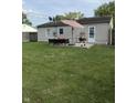 Spacious backyard features a patio with outdoor seating, perfect for entertaining and relaxation at 174 Jordan Dr, Franklin, IN 46131