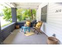 Inviting front porch with charming decor, seating, and a relaxed outdoor atmosphere at 2650 S Meridian St, Indianapolis, IN 46225