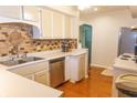 Functional kitchen features stainless steel appliances and ample counter space at 2650 S Meridian St, Indianapolis, IN 46225