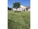 Well maintained exterior and lawn of a beautiful brick home at 712 Disciples Way, Greenwood, IN 46143