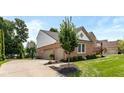 Attached three-car garage with an extra basketball hoop on the side of the property at 11995 Gray Eagle Dr, Fishers, IN 46037