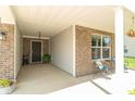 Cozy, covered front porch with seating area, perfect for relaxing outdoors at 19555 Kailey Way, Noblesville, IN 46062