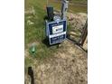 RISE Builders sign advertising the lot for sale, marked as Lot # U4 with contact information in a grassy lot at 1424 Chatham Ridge Ct, Westfield, IN 46074