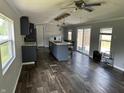 Open concept kitchen featuring a large island, sleek cabinetry, and natural light at 4466 Buffalo Ln, Martinsville, IN 46151